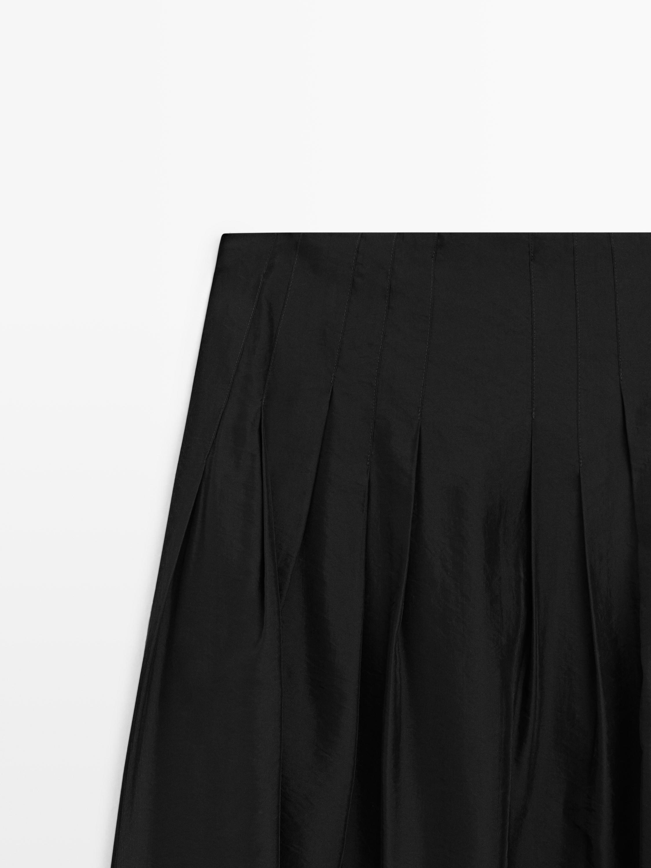 Jupe midi fluide avec détails de pinces